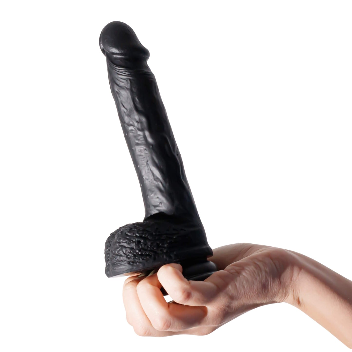 Talla de 22 cm del Inviktus sujeta con una mano, para hacerse a la idea del tamaño